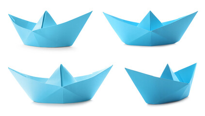 Poster - Set with light  blue paper boats on white background