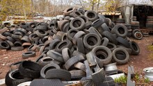 Salvage Yard Containing New, Old, And Rare Cars, And Trucks. Engine Parts.