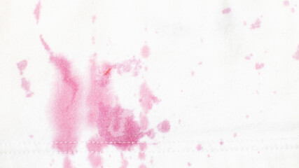 Wall Mural - dirty stains on clothes from berries on a white background close