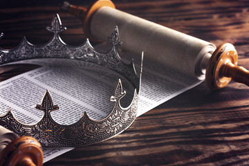 a kings crown on a hebrew scroll