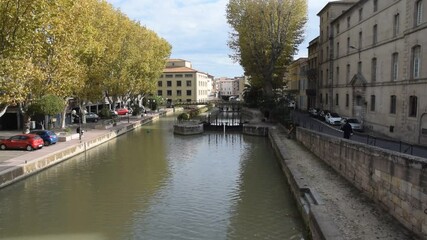 Wall Mural - Narbonne, Aude, Languedoc, Occitanie : écluse du canal de la Robine, en centre-ville.