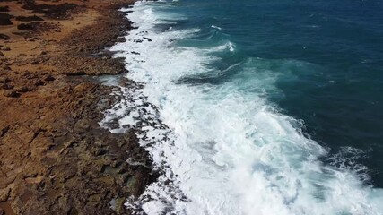 Wall Mural - Aerial view flying along the coast of Cyprus