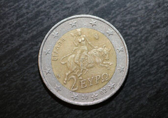 Macro shots of euro coins background 2 Euro coin year of manufacture 2002 country Greece high quality big size prints