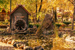 Autumn in the park. Decorative mill and pond.  Loga Park. Kamensk-Shakhtinsky. Rostov region. Russia