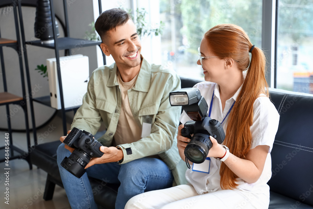 Young photographers during classes in studio