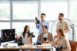 © Pixel-Shot - Professional photographer teaching young people in studio