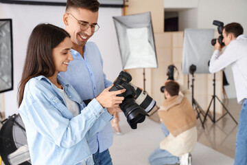 Wall Mural - Young photographers during classes in studio