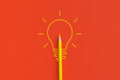© LunaKate - Light bulb on red background. Inspiration and creative idea concept. Top view with copy space. Flat lay composition.