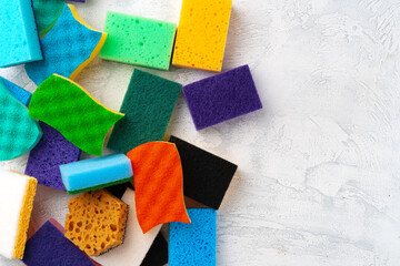 Wall Mural - Pile of colorful cleaning sponges on gray background