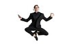 © master1305 - Young man in black business suit dancing isolated on white background. Art, motion, action, flexibility, inspiration concept.