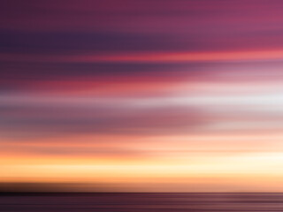 Wall Mural - Long Exposure sunset, streaky colors in the sky, wallpaper, background