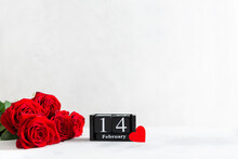 Valentine's Day Background With Red Roses Bouquet, Hearts And Calendar With The Date 14 February On White Background. Greeting Card Template For Valentines Day. Side View, Copy Space