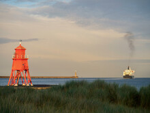 The Groyne, South Shields, And Ferry Sailing Out Into The Sea From Newcastle To Amsterdam