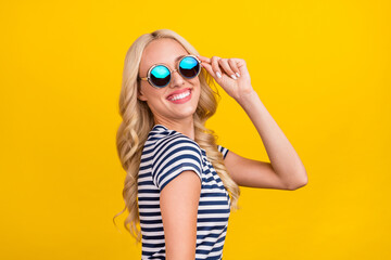 Poster - Photo portrait woman wearing casual clothes sunglass smiling got good mood isolated vivid yellow color background