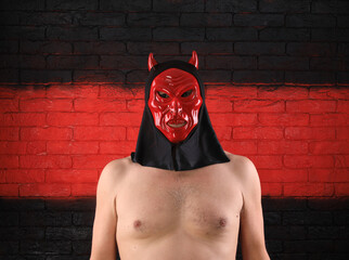 Sticker - portrait of a naked man in a mask of the devil