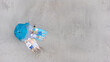 © Mat Hayward - Aerial view captured by drone of a family of four laying down and relaxing on a sandy ocean beach together