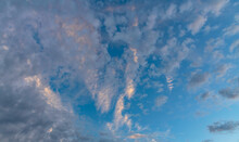 Puffy Altocumulus Clouds In A Blue Sunrise Sky