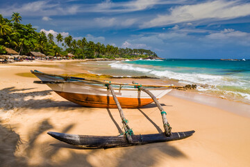 Wall Mural - Untouched tropical beach with palms and fishing boats