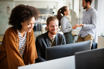 software engineers working on project and programming in company