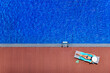 © Loginova - Woman near swimming pool.