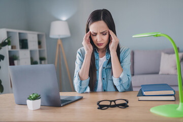 Sticker - Photo of unhappy upset mature woman hold hands headache bad mood overworked inside living-room house flat apartment