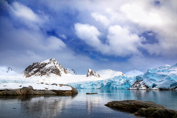 Wall Mural - mountains, snow and blue glacial ice of the smeerenburg glacier, svalbard