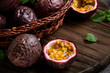 Delicious juicy passion fruit on gray table background.
