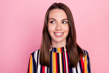 Poster - Photo of pretty adorable young lady wear striped shirt smiling looking empty space isolated pink color background