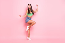 Photo Of Shiny Funky Young Woman Hair Dressed Green Singlet Smiling Dancing Isolated Pink Color Background