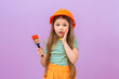 © Юлия Дьякова - The little girl is surprised by the upcoming painting of her room.