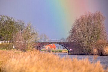 Sticker - Stone arch bridge with rainbow in background