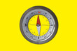 Follow the direction - concept with navigational compass on colored background