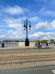 Wall Mural - Cycliste sur le pont de Pierre à Bordeaux, Gironde