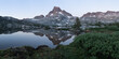 Sunrise in the High Sierra mountains reflection in alpine lake