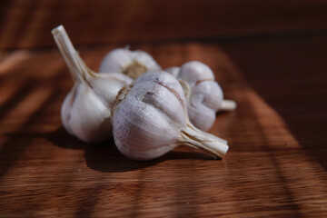 Sticker - Closeup of garlic on a wooden surface