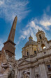 Obelisk in Piazza Navona with cathedral in the background