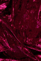 Wall Mural - red velor crinkled as background close up, red velvet fabric