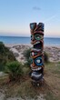 totem pole on the beach
