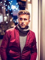 Wall Mural - Handsome young man outdoor in winter fashion