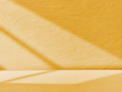 Fototapete - Yellow concrete background with light from the window