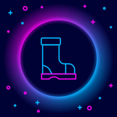 Poster - Glowing neon line Waterproof rubber boot icon isolated on black background. Gumboots for rainy weather, fishing, gardening. Colorful outline concept. Vector