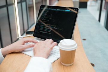 Wall Mural - write code or learn new programming languages. pumping skills, online training. a thin modern laptop