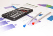 © Den - Accounting data, charts, calculator and pen. Many charts and gra