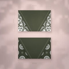 Dark green business card template with abstract white ornament for your brand.