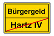 Gelbes Schild Bürgergeld und Hartz IV auf weissem Hintergrund