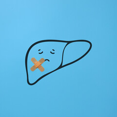 silhouette of the liver with a patch. symbol of liver disease and treatment