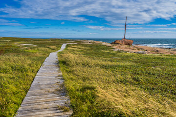 Wall Mural - View on the Brion's shipwreck in Kegaska, a small fishing town located at the very end of scenic road 138, in Cote Nord region of Quebec, Canada