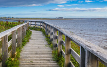 Boardwalk Leading To The "Galets" Historic Site A 150 Years Old Fisherman Camp Located In Natashquan, Small Fishing Town Of Cote Nord Region Of Quebec  (Canada)