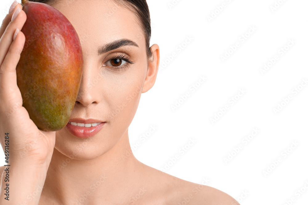 Portrait of woman with mango on white background