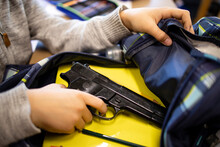 Active Shooter Taking Gun In Classroom Ready For Mass School Shooting.